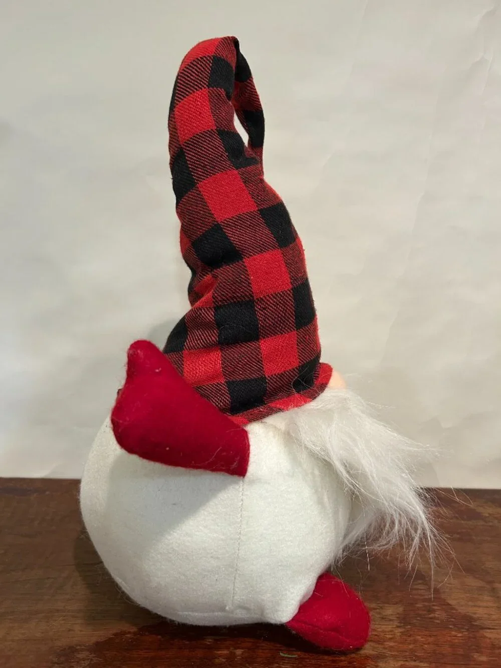 Christmas Holiday Gnome with black and red buffalo plaid cap and wispy white bea